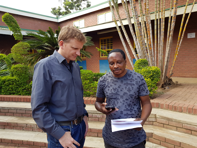 Christian Brümmer giving an interview on air to the local radio station Phalaphala FM.